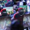 Les aficionados de jeux vid&eacute;os jouant sur les ordinateurs &agrave; disposition lors de la Gamescom 2025, &agrave; Cologne. (IMAGO/CHRISTOPH HARDT/SIPA)